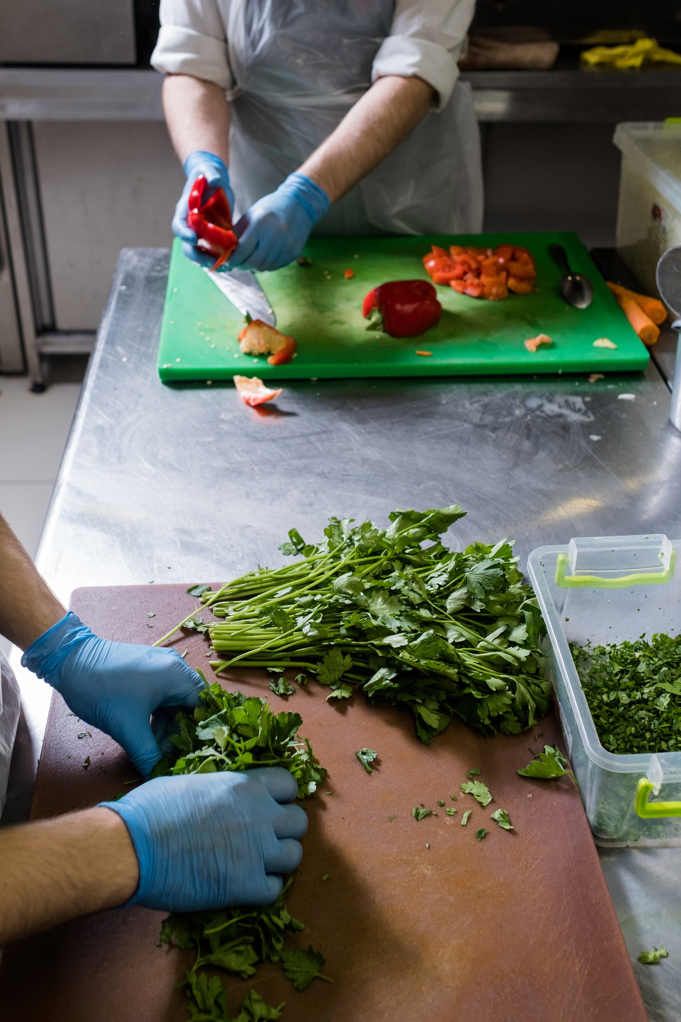 Artisan kitchen team prepping fresh ingredients
